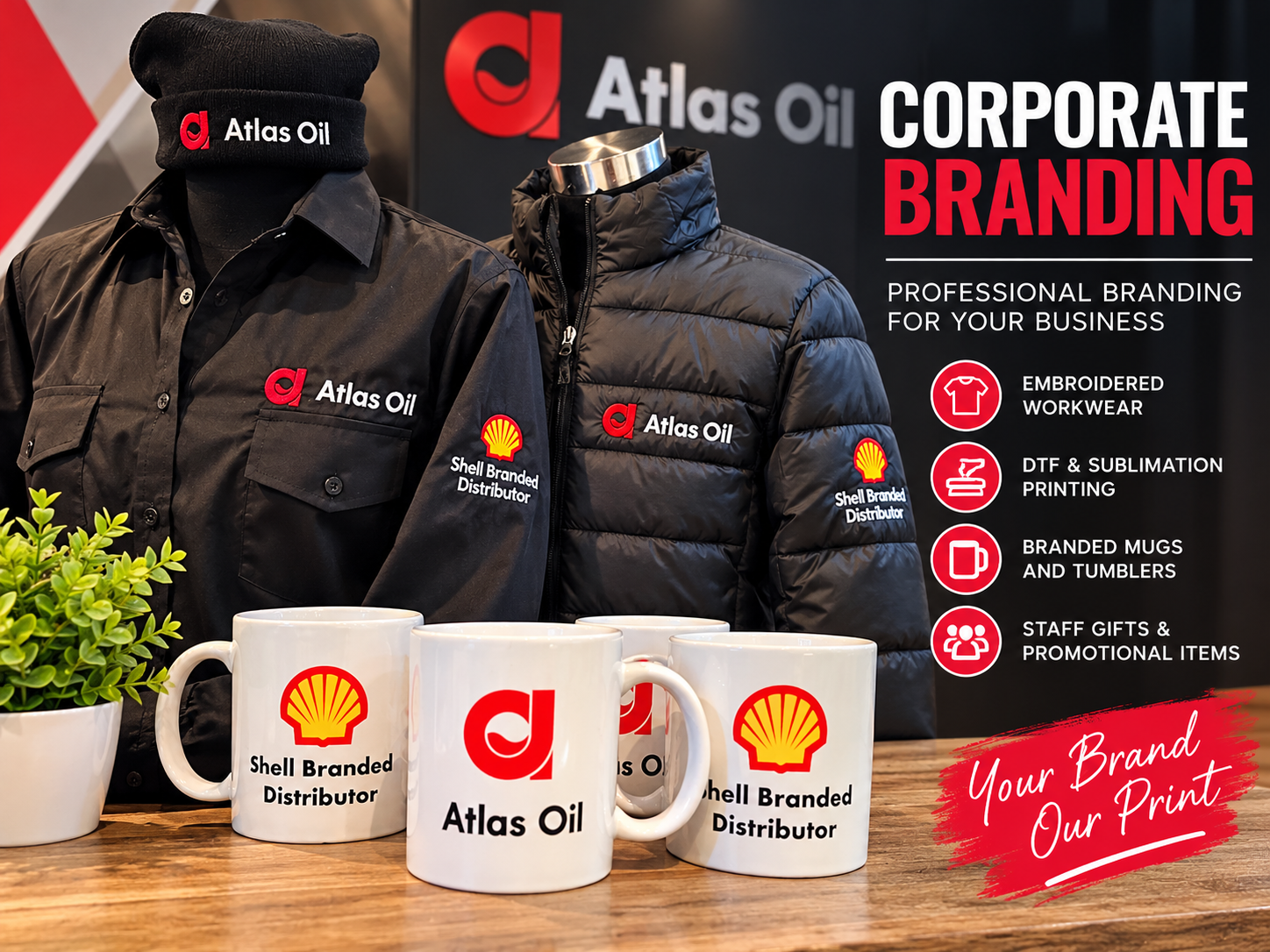 Corporate branding display featuring embroidered workwear, branded jackets and corporate mugs